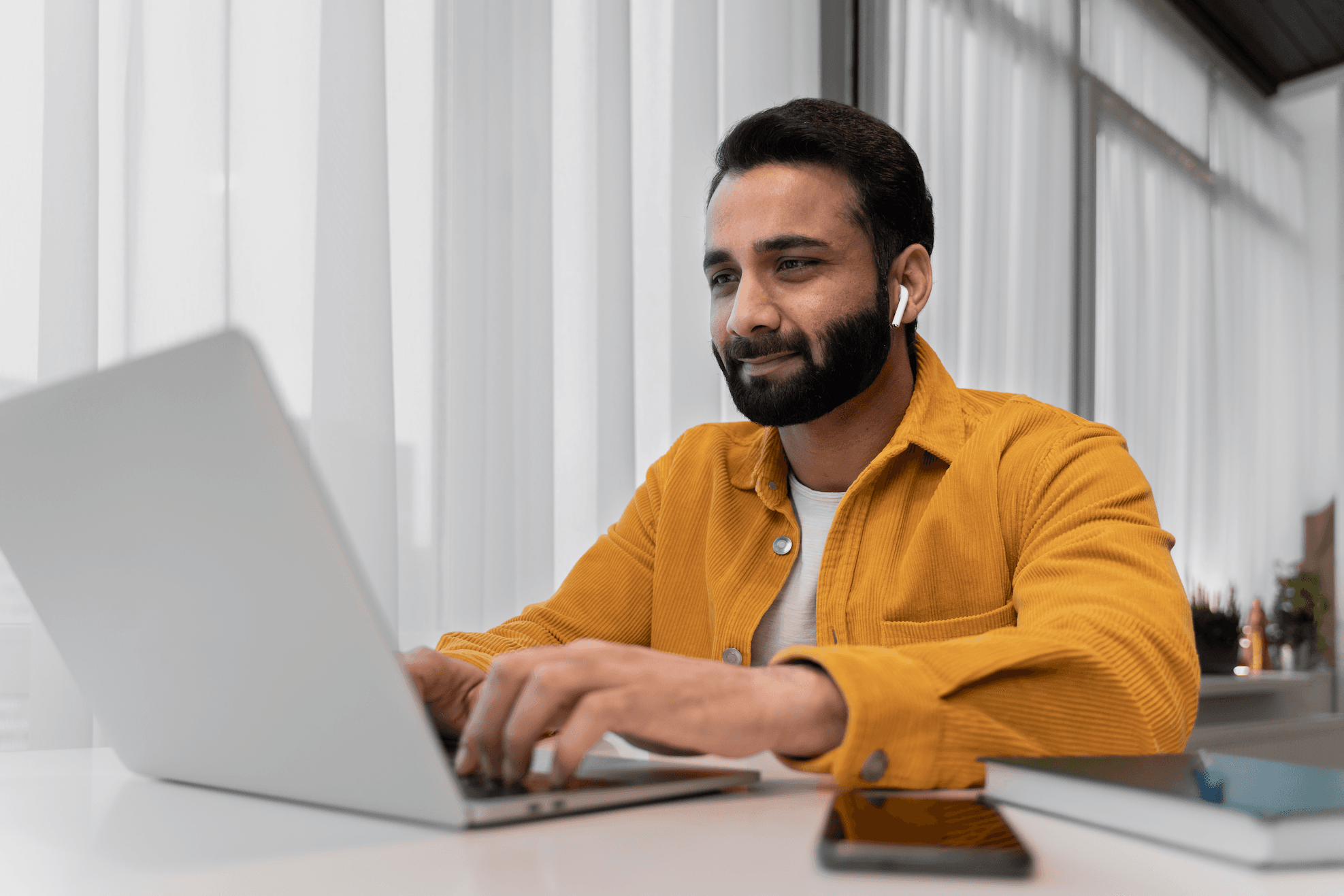 man working with a laptop